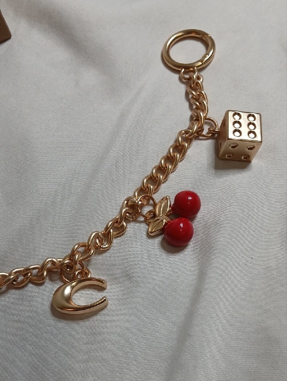 Coach Gold-Tone Motif Chain Bag Charm with Red Cherry and Dice - Picture 2 of 4